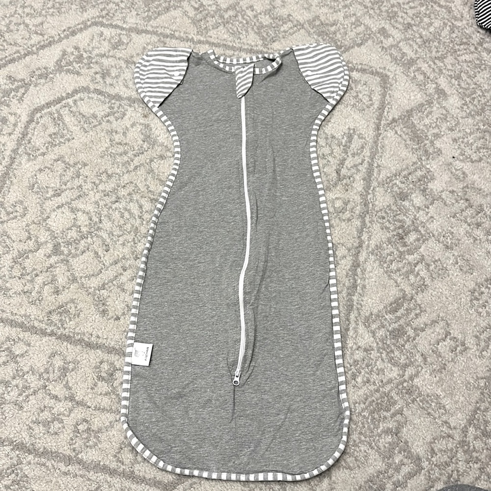 Insular baby sleep sack where baby can move hands